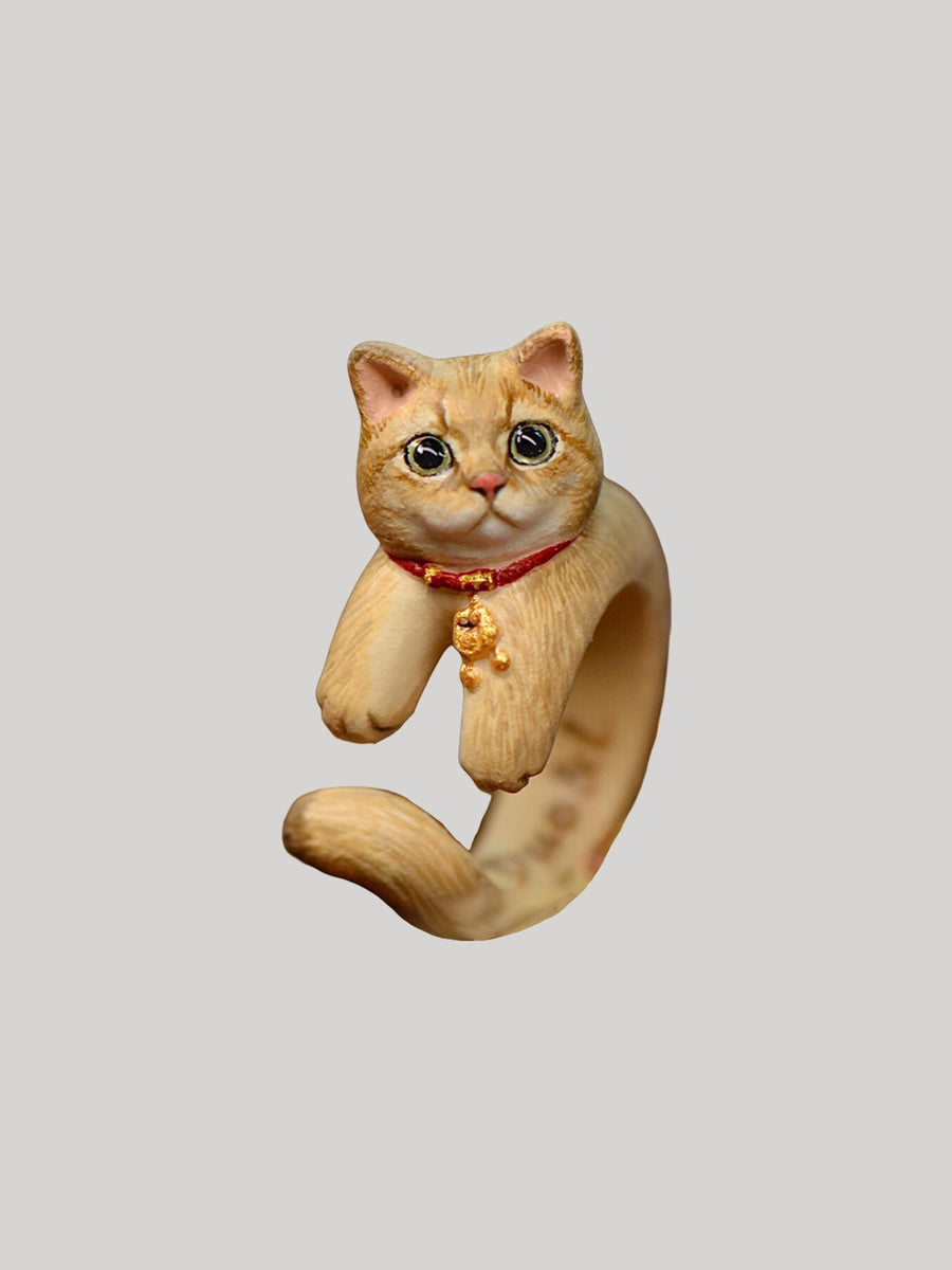 Handcrafted three-dimensional clay pet portrait ring made from a pet photo